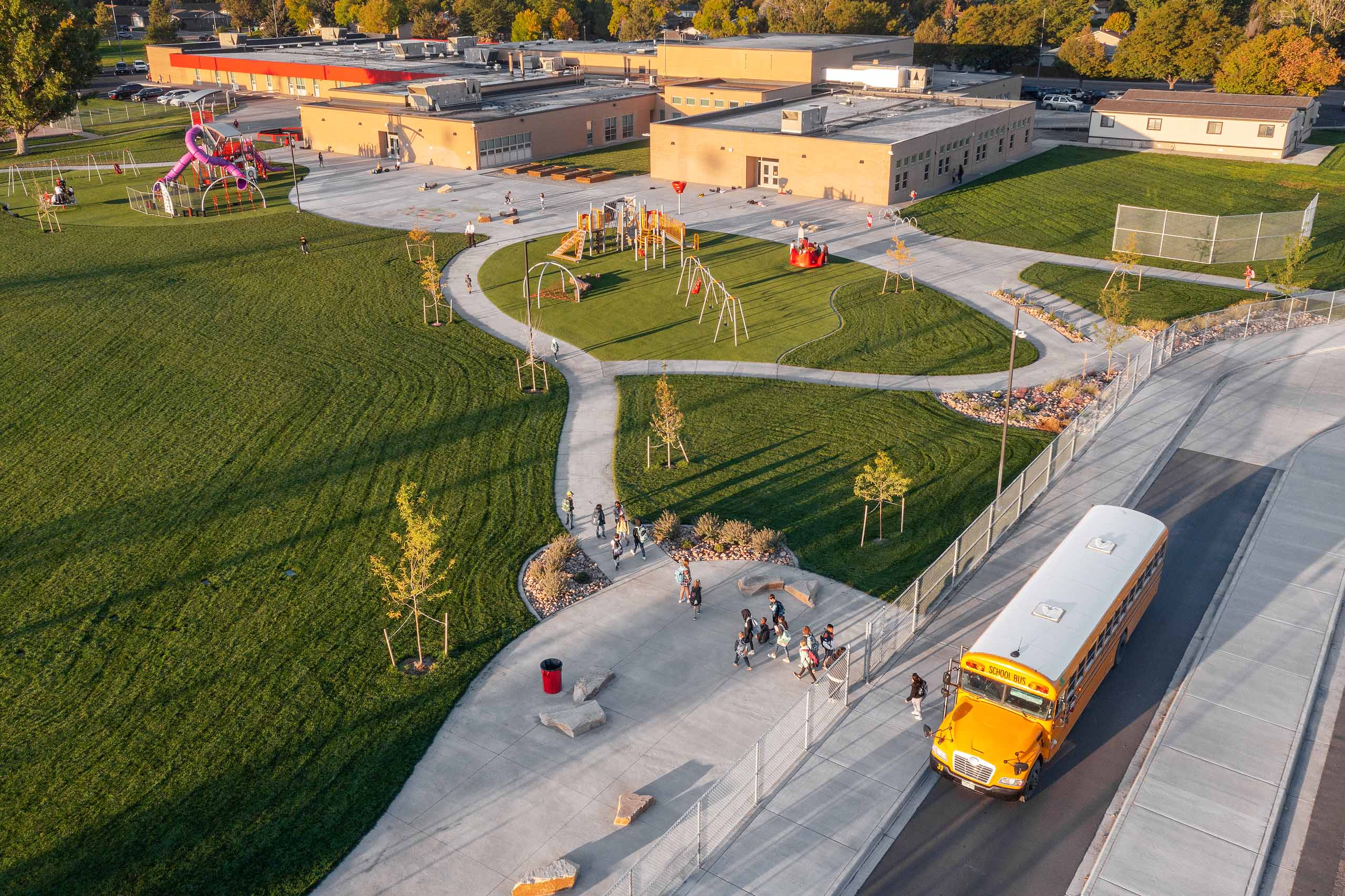 Aerial drone photography. New drop off and pick up bus lane at Eaton Elementary school. K-12 remodel project by RB+B Architects and FCI Constructors.
