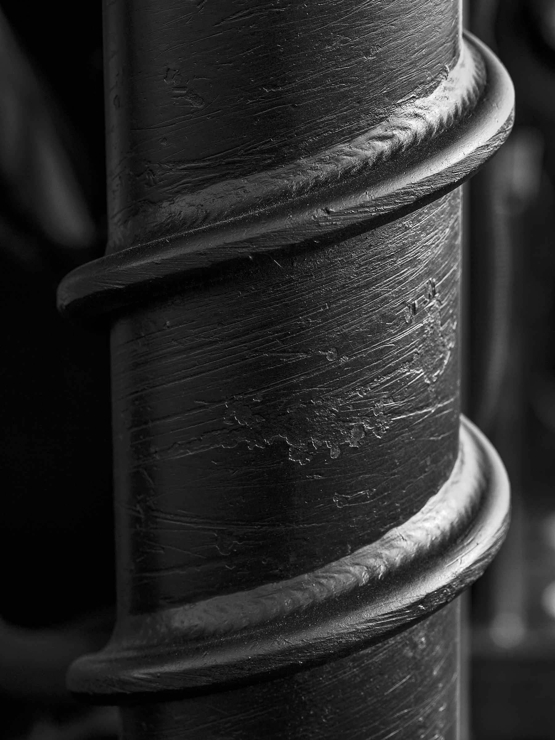 Industrial photography by Warren Diggles. Close up of drill bit for underground boring equipment.