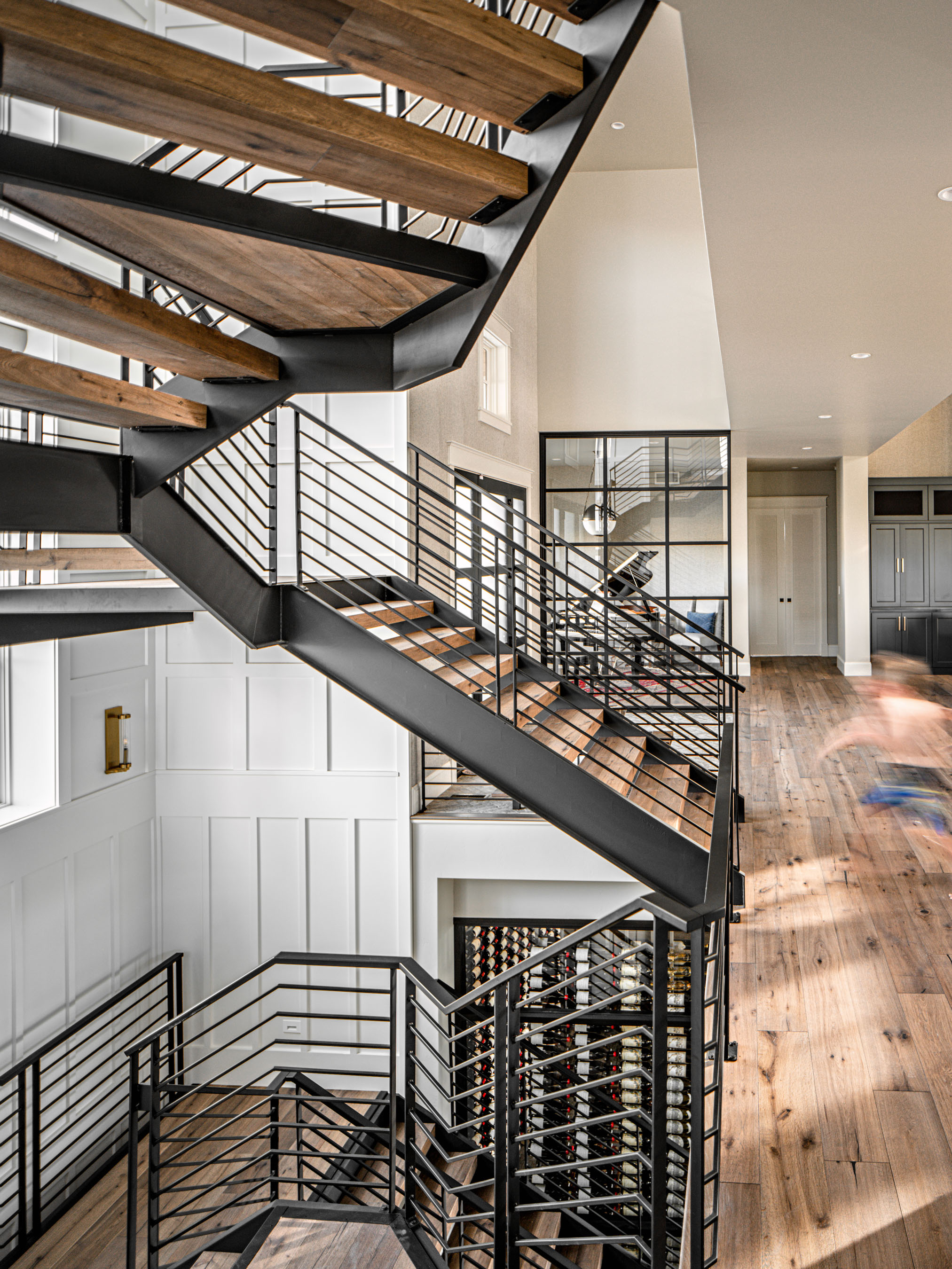 Residential architecture photography by Warren Diggles. Custom steel stairway. New construction project by Brannen Homes.